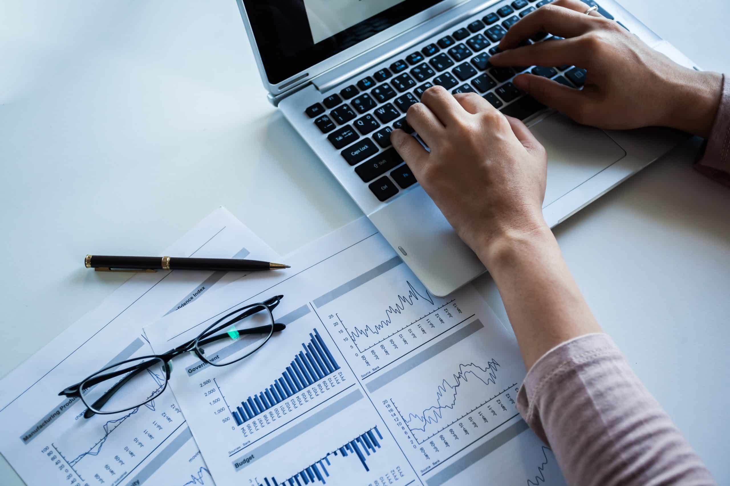 Person typing on laptop